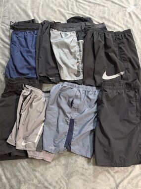 Nike Men’s lot shorts.And Nike unlimited pants. 2 black pair are H&M All XL